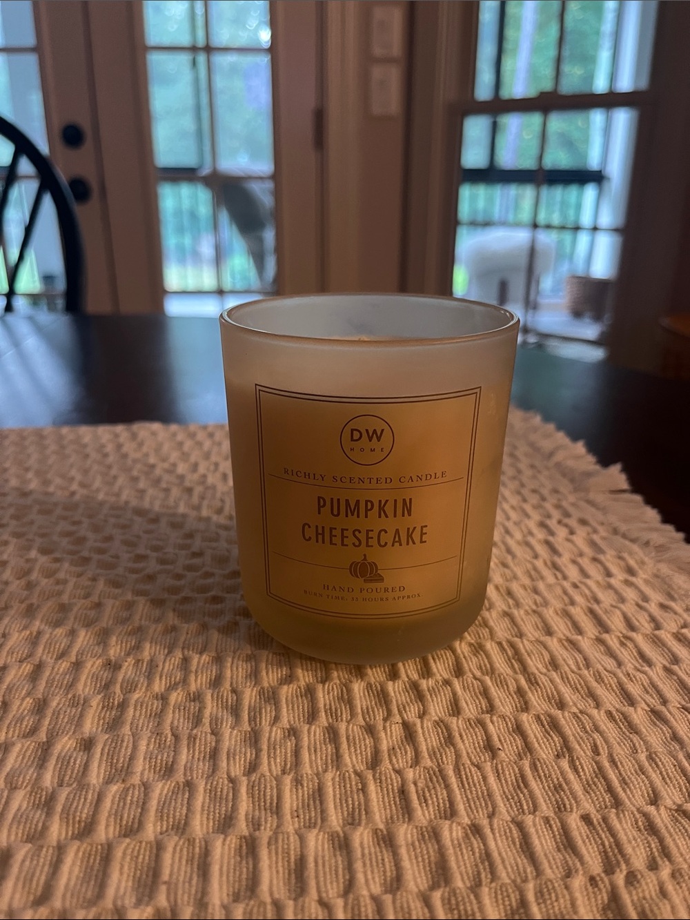 DW Home Pumpkin Cheesecake Candle in Soft Yellow Frosted Glass